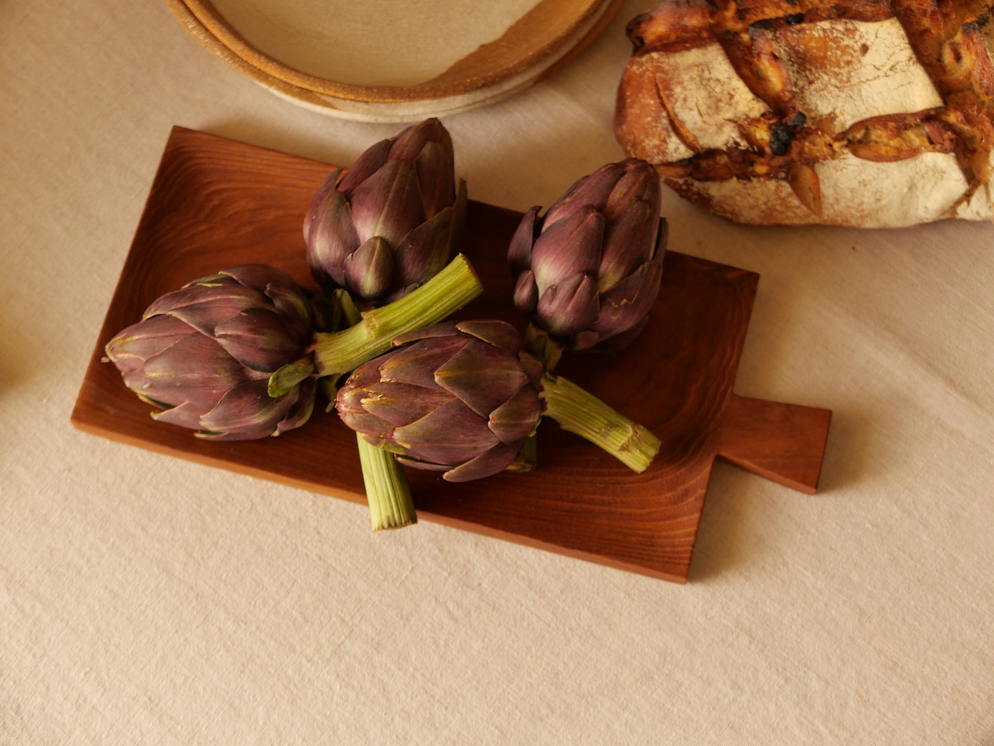 ASSIETTE-PLATEAU AVEC ANSE